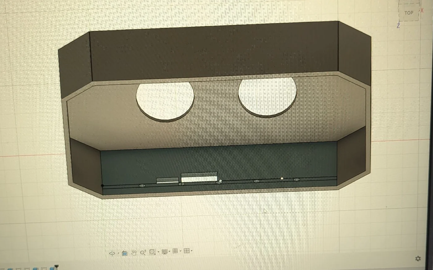 The headset shell modelled in Autodesk Fusion, with two lens cut-outs